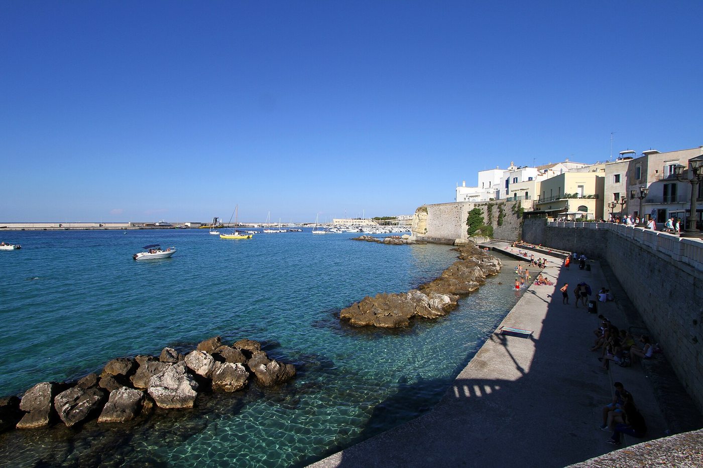 The old town of Otranto above turquoise water &mdash; about 25 minutes from Cala dei Balcani, Salento