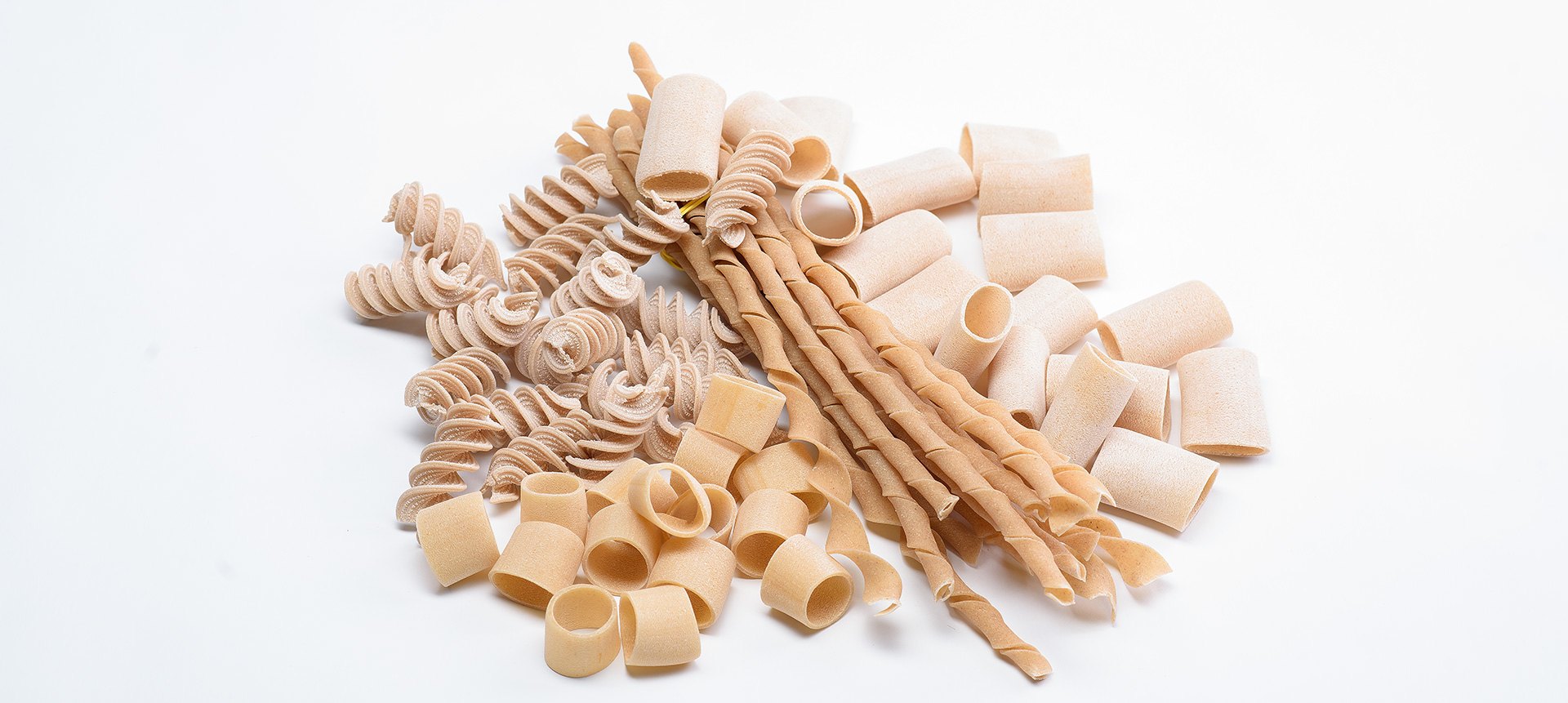 The shapes of Brunitta’s Senatore Cappelli pasta: bronze-drawn paccheri, fusilli and troccoli — Salento, Puglia