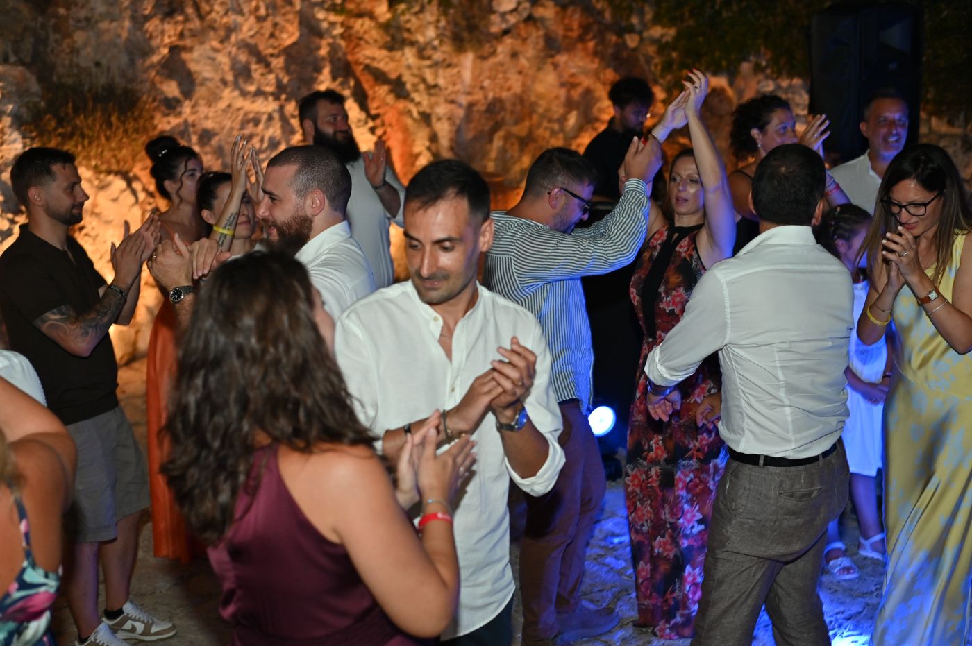 Dancing in the stone courtyard of Cala dei Balcani
