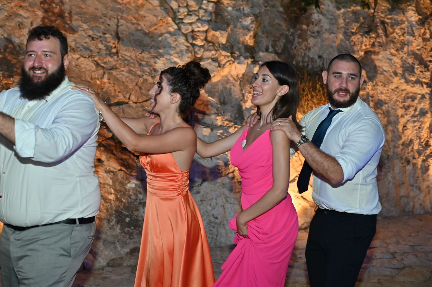 Dancing in the stone courtyard of Cala dei Balcani