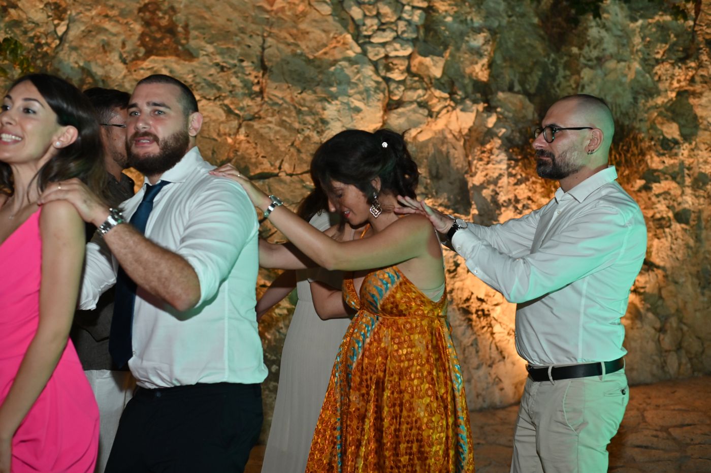 Dancing in the stone courtyard of Cala dei Balcani