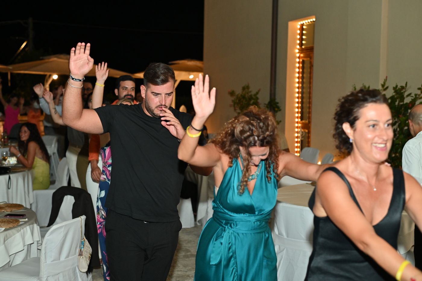 Dancing in the stone courtyard of Cala dei Balcani