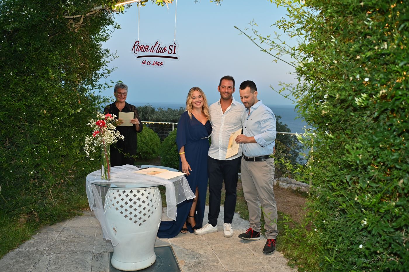 Handing the certificate to the couples renewing their vows