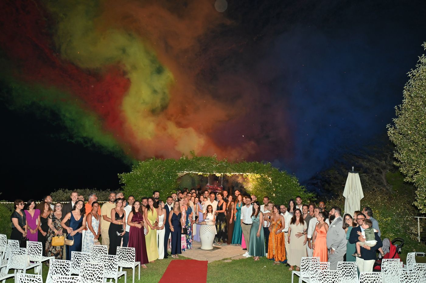 Group photo with coloured smoke at Cala dei Balcani