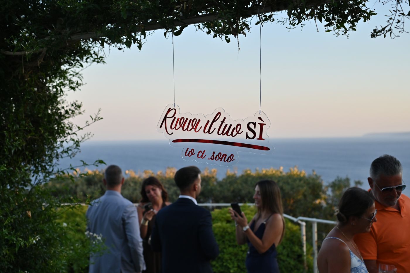 The Rivivi il tuo Sì sign above the Adriatic