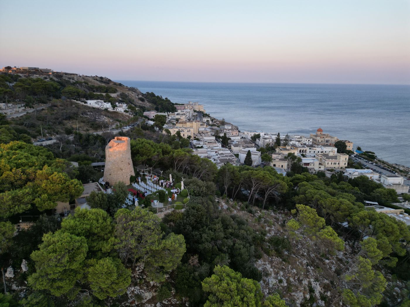 Aerial view of Cala dei Balcani at sunset with the Saracen tower, Santa Cesarea Terme